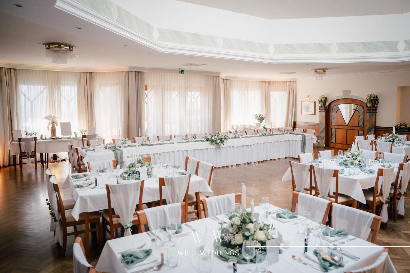 Long banquet table in the function hall of Gasthaus Hirschbeck